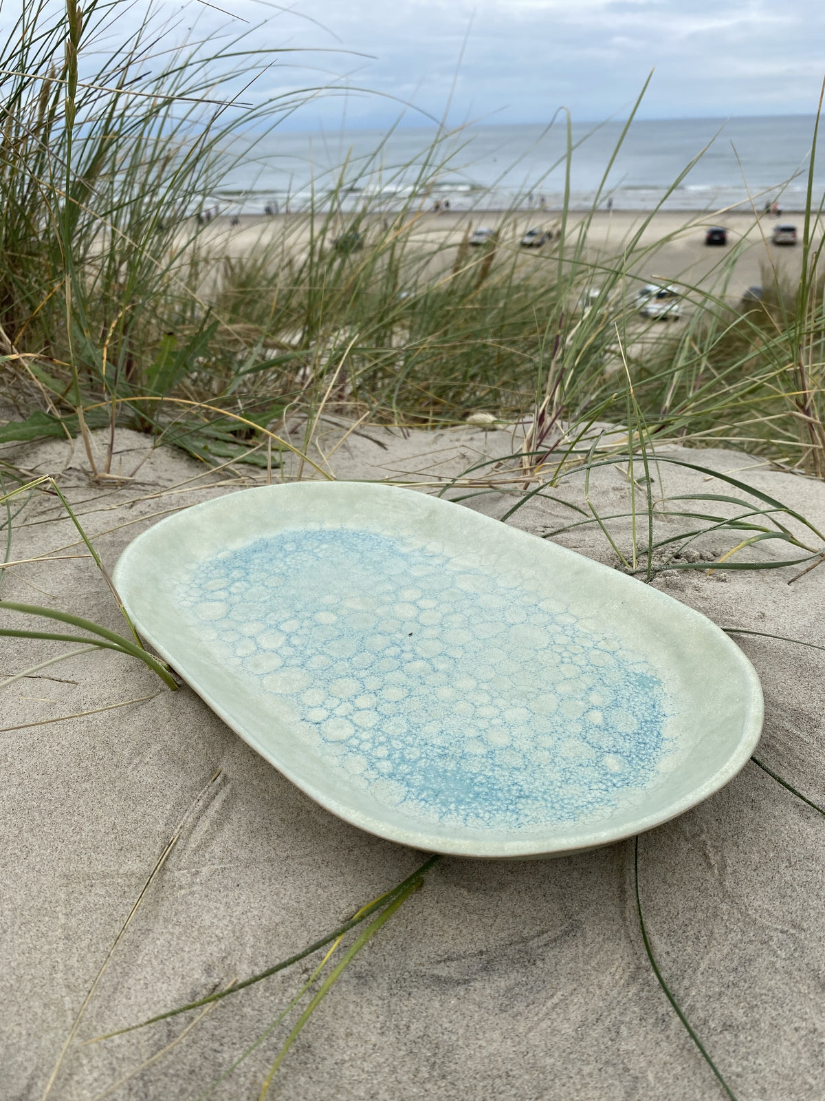 Fad Blue Bubbles set skråt ovenfra i sandet